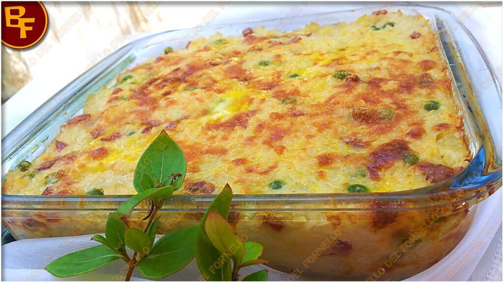 Timballo di riso con piselli pancetta affumicata e provola