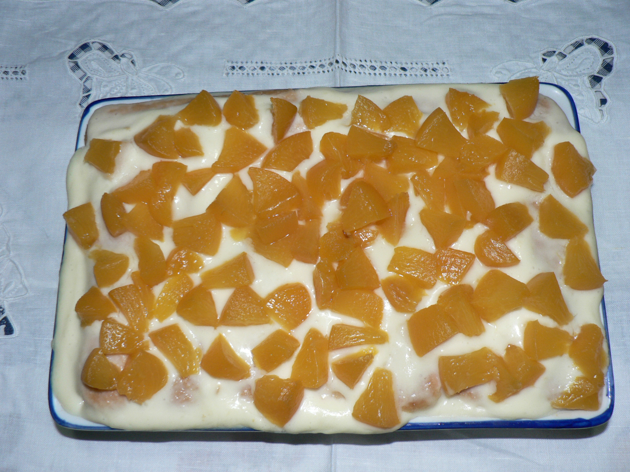 Tiramisu’ alla crema e pesche sciroppate
