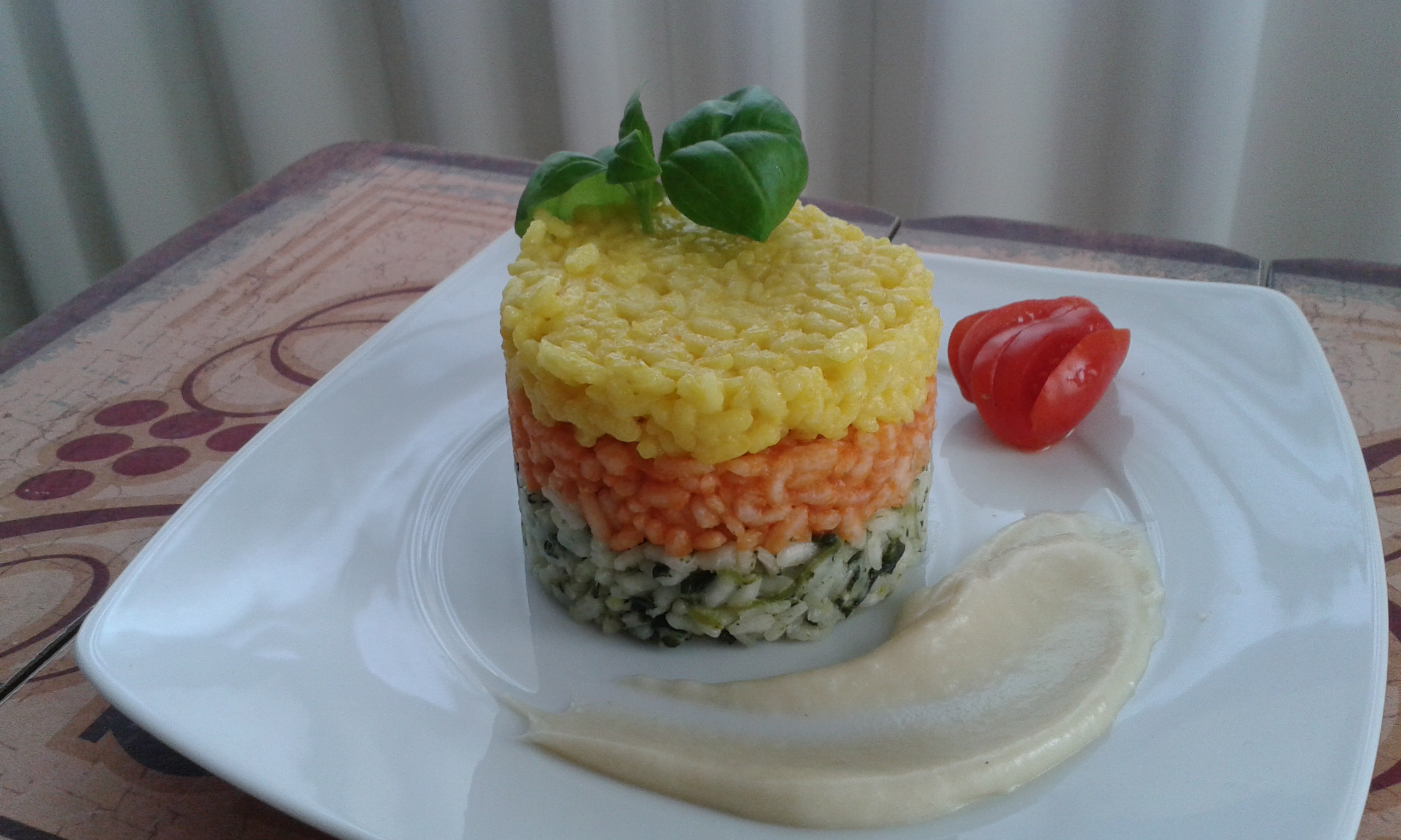 Torretta di risotti e fonduta di parmigiano