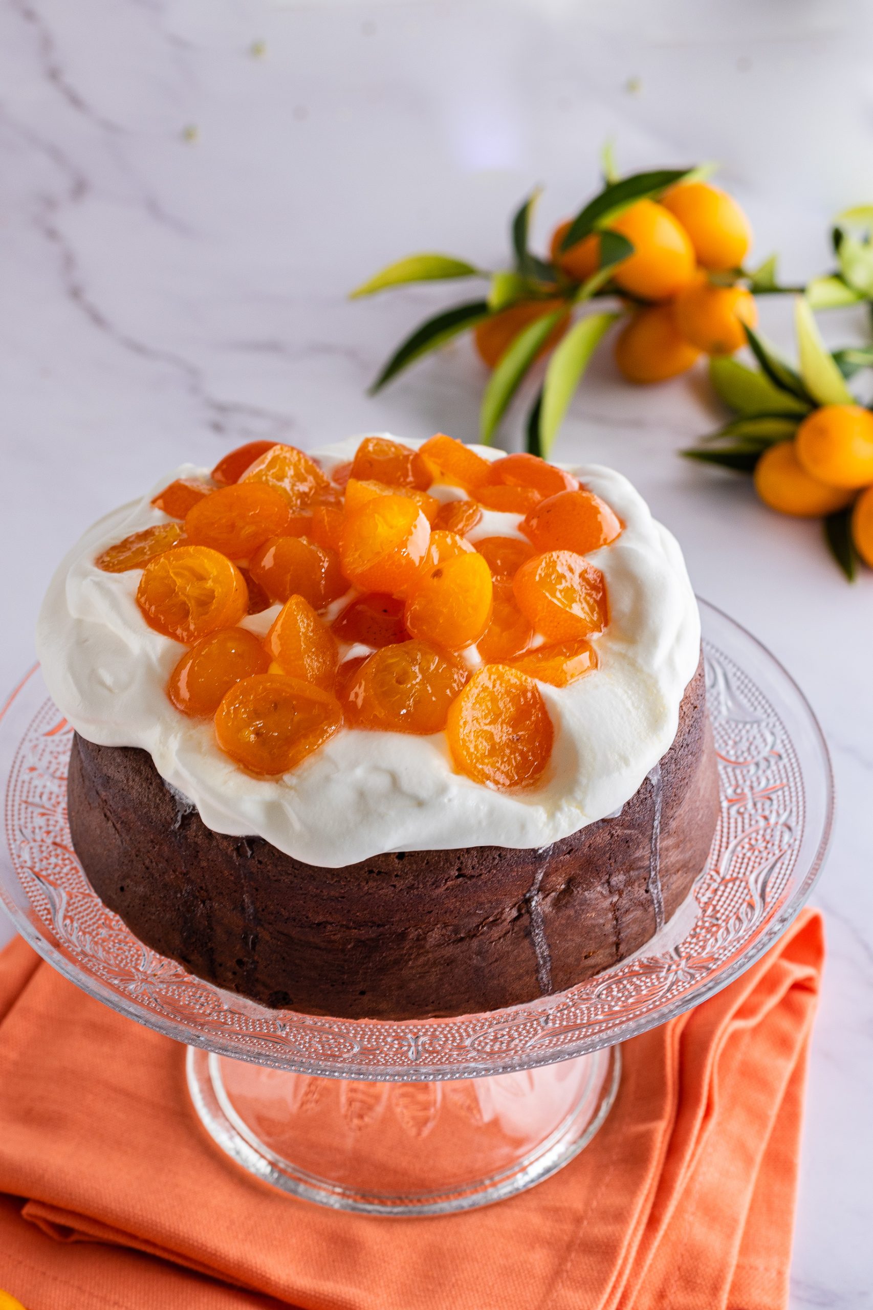 Torta al cioccolato con kumquat caramellati