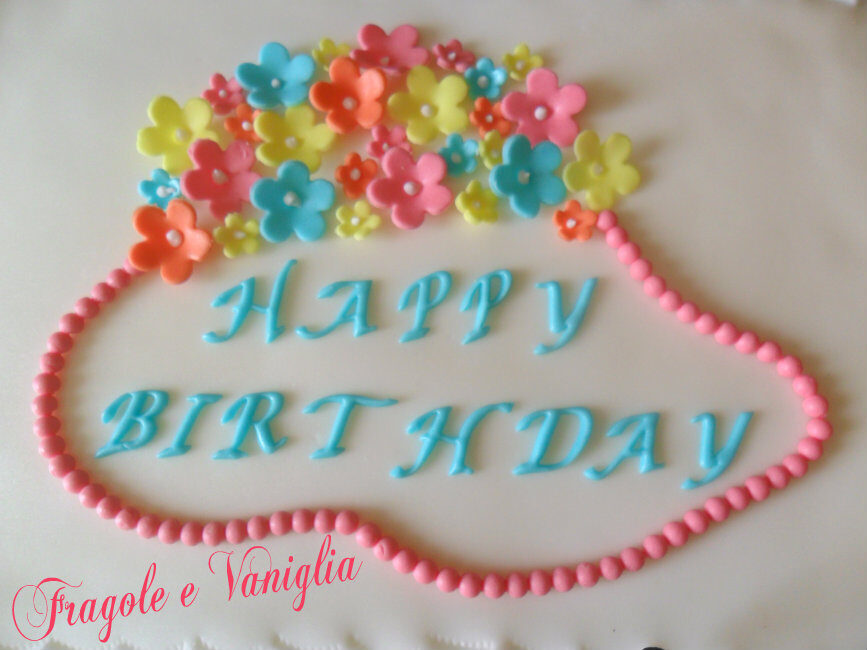 Torta con fiori colorati