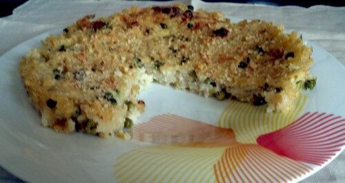 Torta di riso piselli capperi mollica brodo vegetale uova