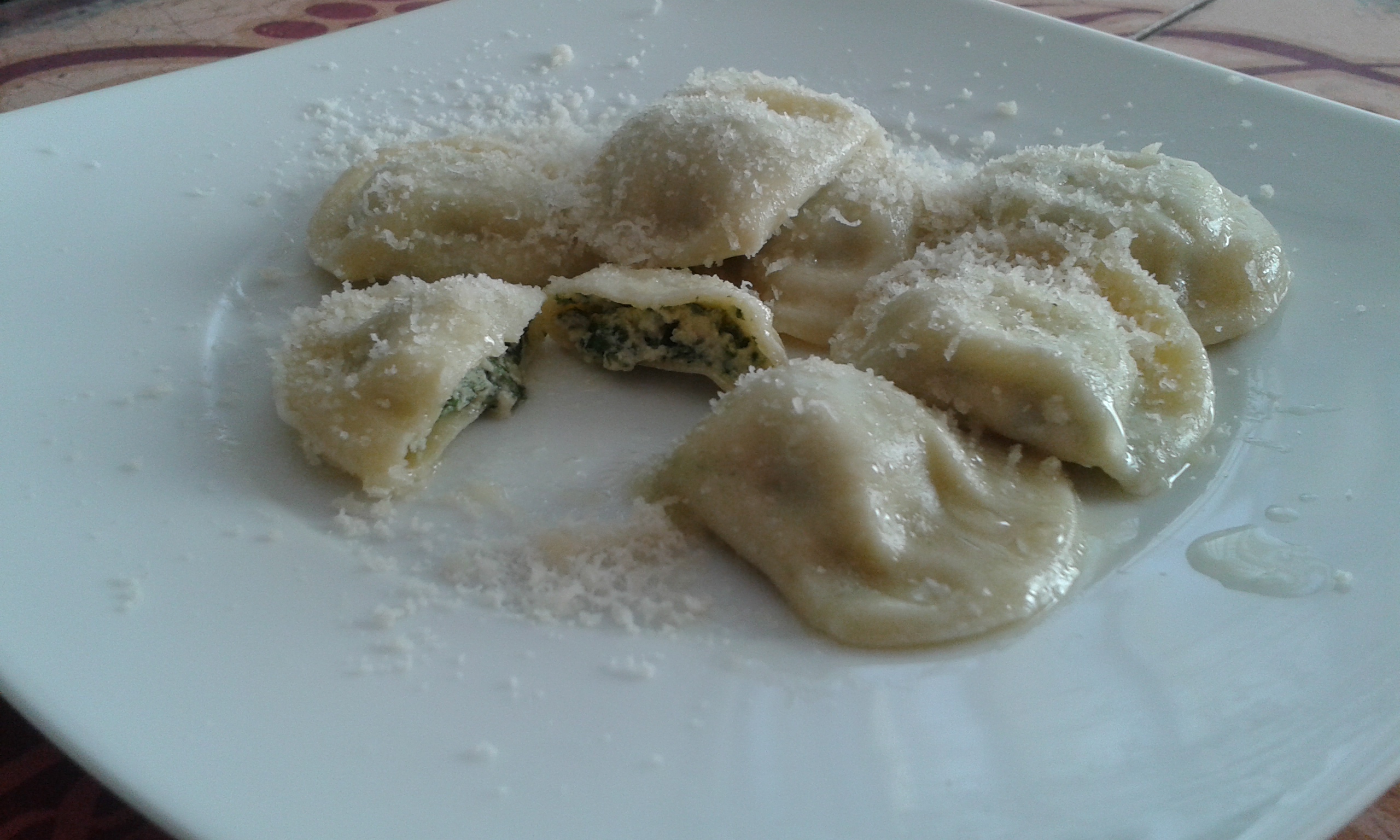 Tortelli mezzaluna agli spinaci