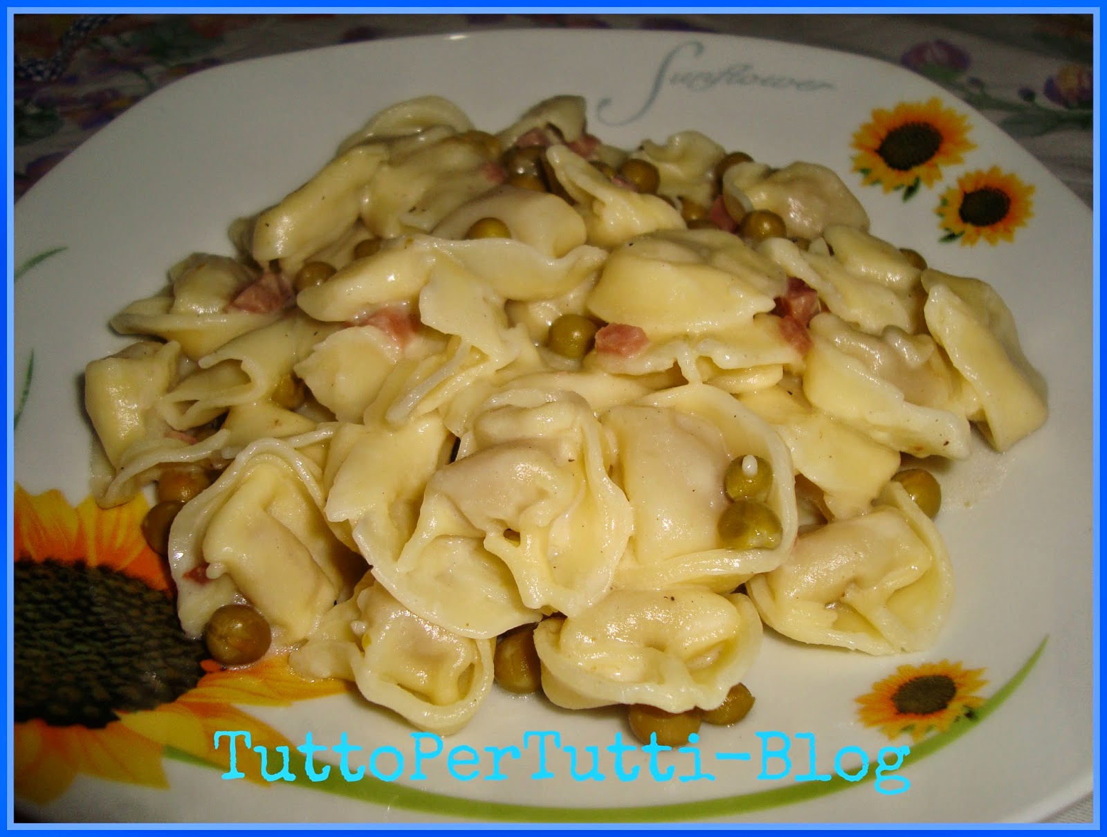 Tortellini panna, piselli e prosciutto