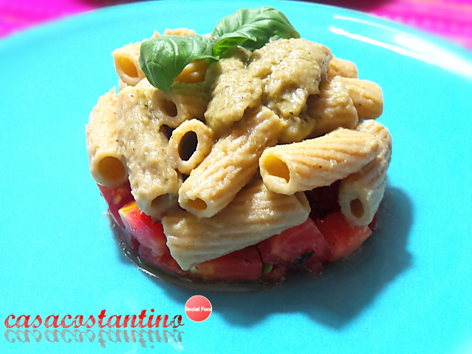 Tortiglioni integrali con crema di melanzana e pomodoro fresco