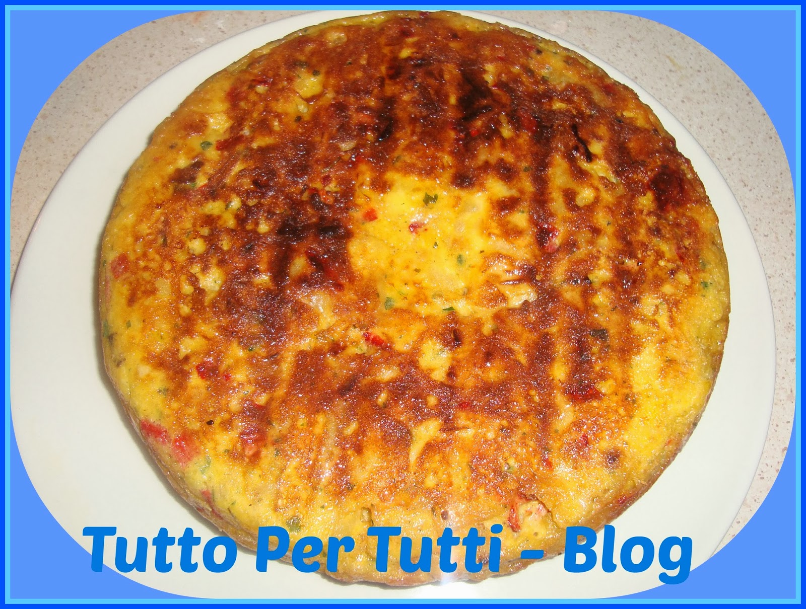 Tortilla papas con cebolla y pimiento rojo – spagna