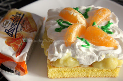 Tortino buondolce agli agrumi con lemon curd e panna montata