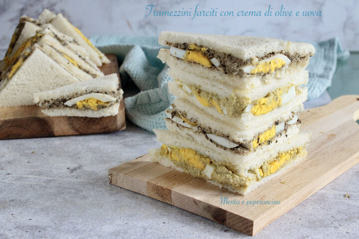 Tramezzini farciti con crema di olive e uova