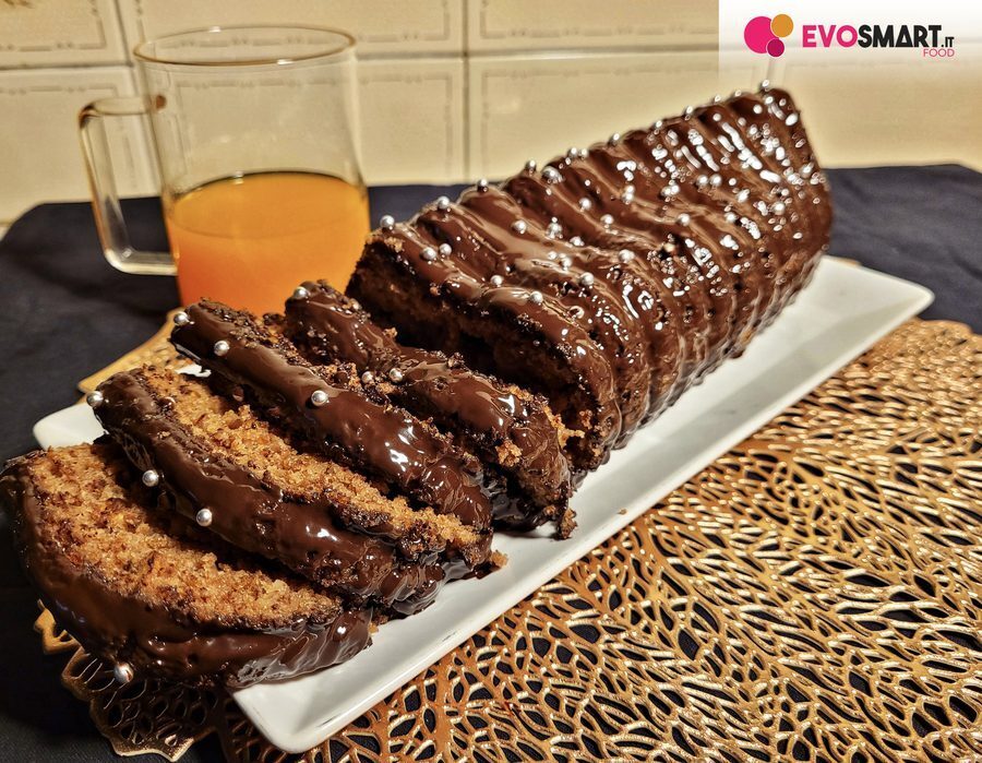 Tronchetto noci e cacao con glassa al cioccolato fondente