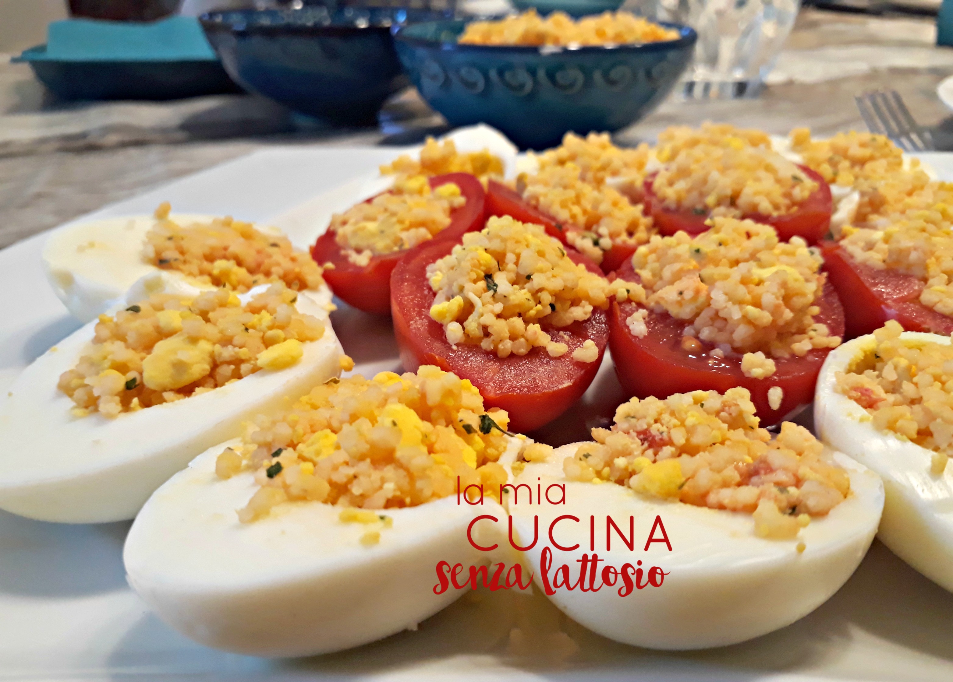 Uova e pomodori ripieni di cous cous