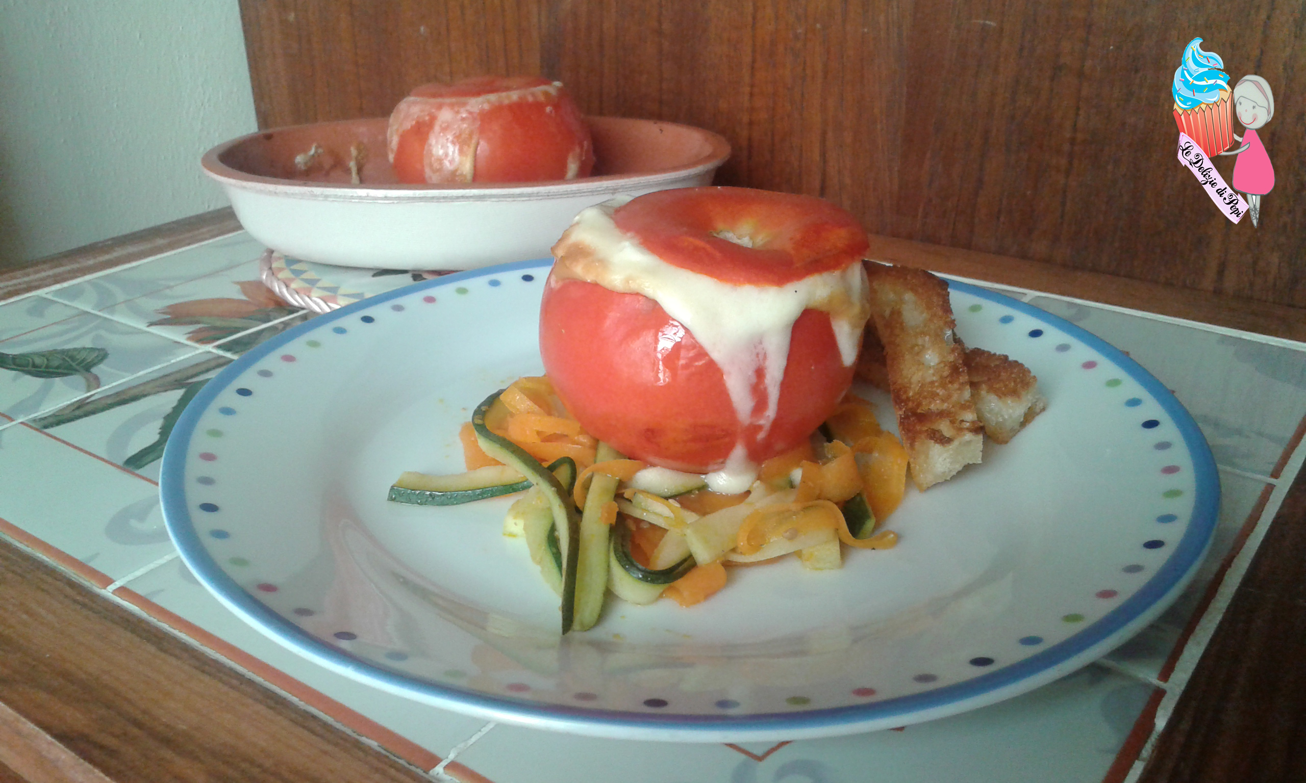Uovo cotto nel pomodoro