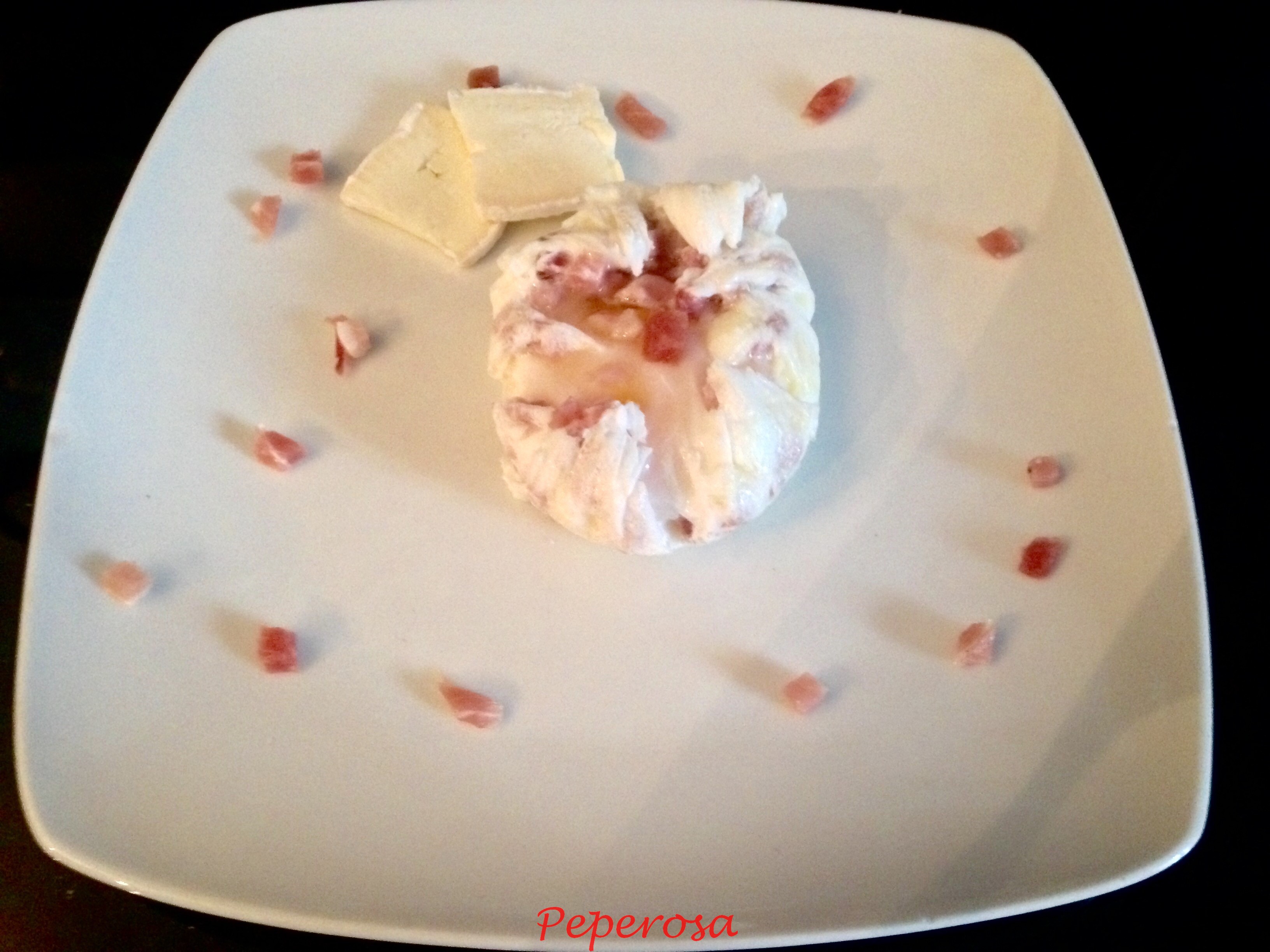 Uovo in camicia speck e brie