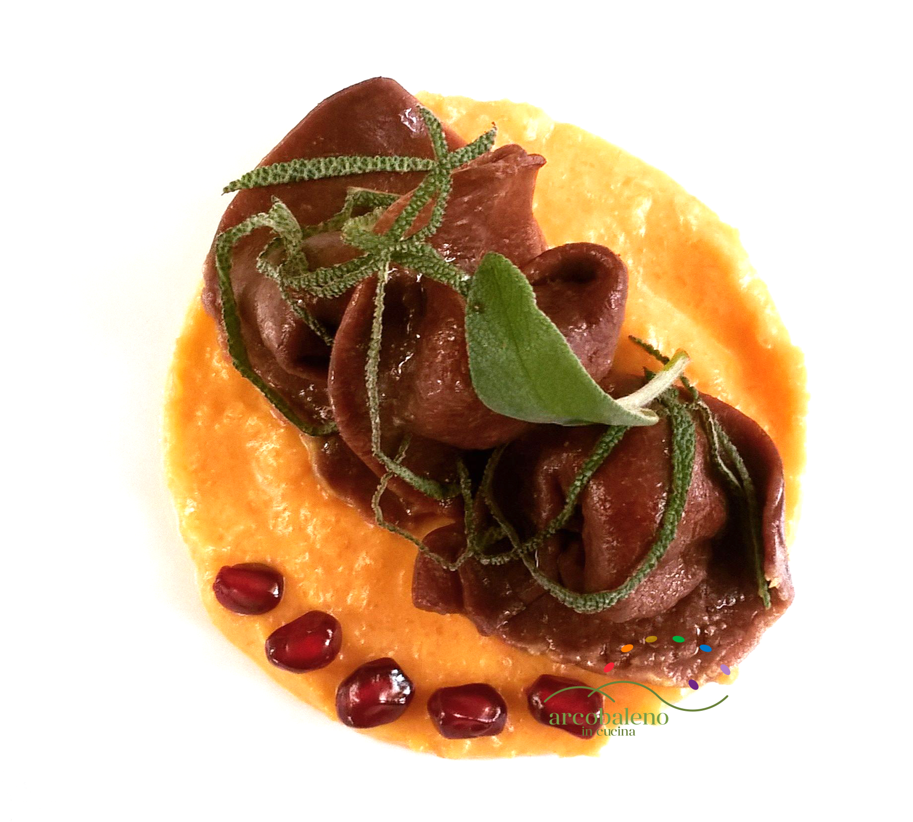 Vegan cappellacci al cacao con crema  di zucca al profumo di salvia e melograno