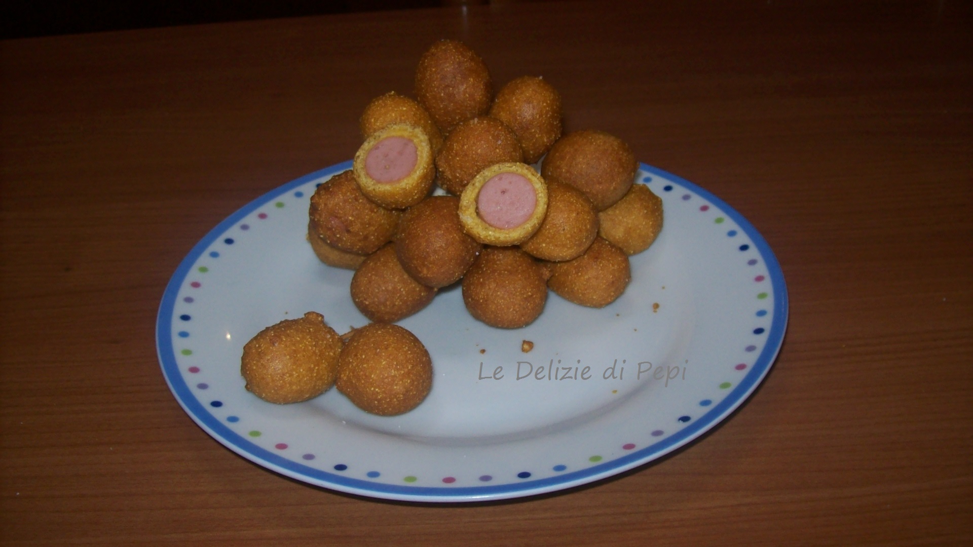 Wurstel pastellati e fritti