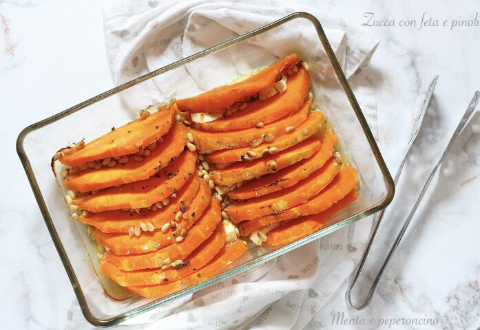 Zucca con feta e pinoli