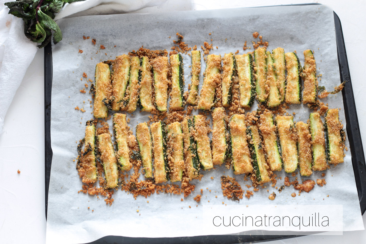 Zucchine gratinate con menta e prezzemolo