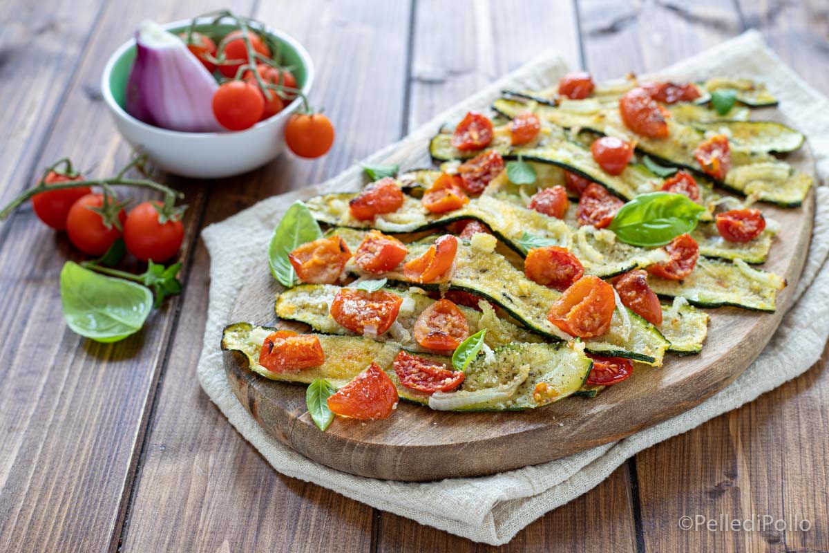 Zucchine gratinate con pomodori e cipolle