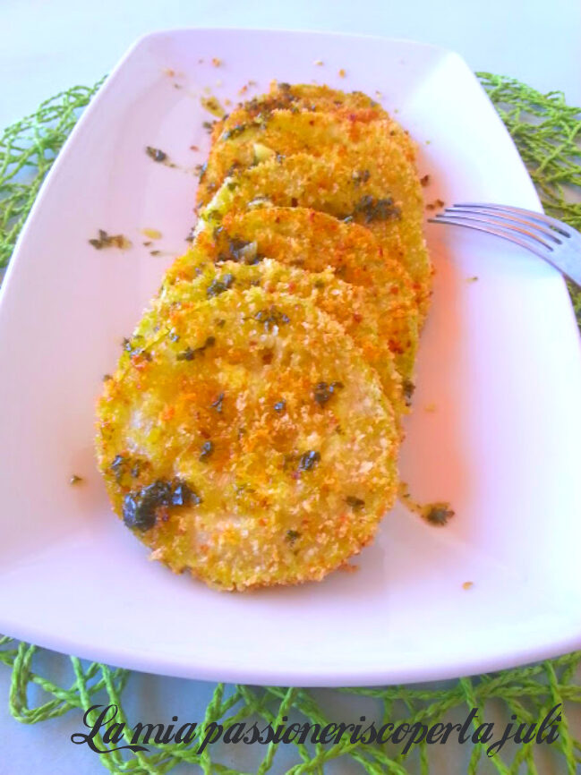 Zucchine impanate con prezzemolo e olio fatta al forno