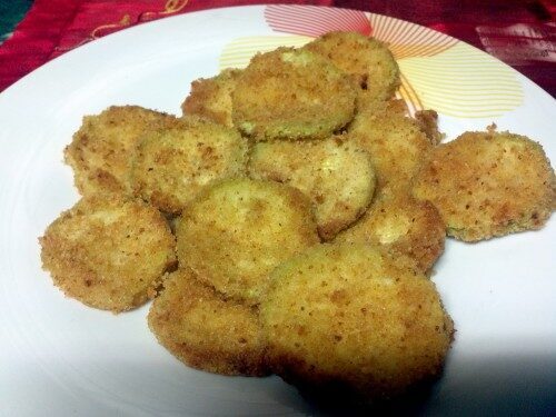 Zucchine impanate forno mollica condita con parmigiano