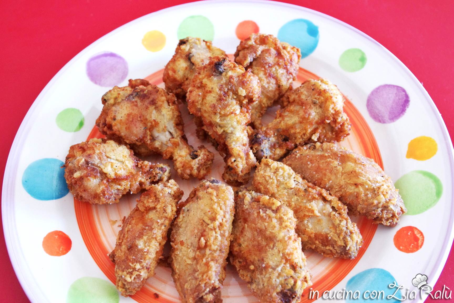 Ali di pollo fritte aromatizzate