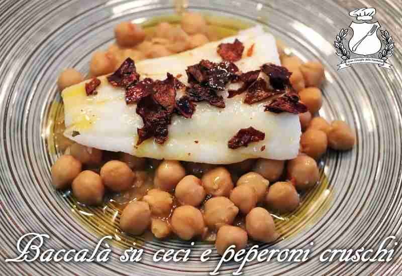 Baccal su letto di ceci con peperoni cruschi