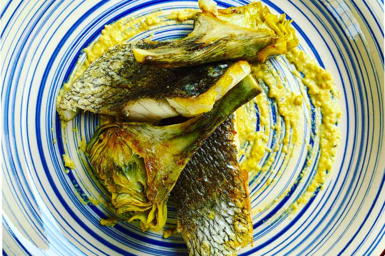 Filetto di ombrina con carciofi e salsa di vongole
