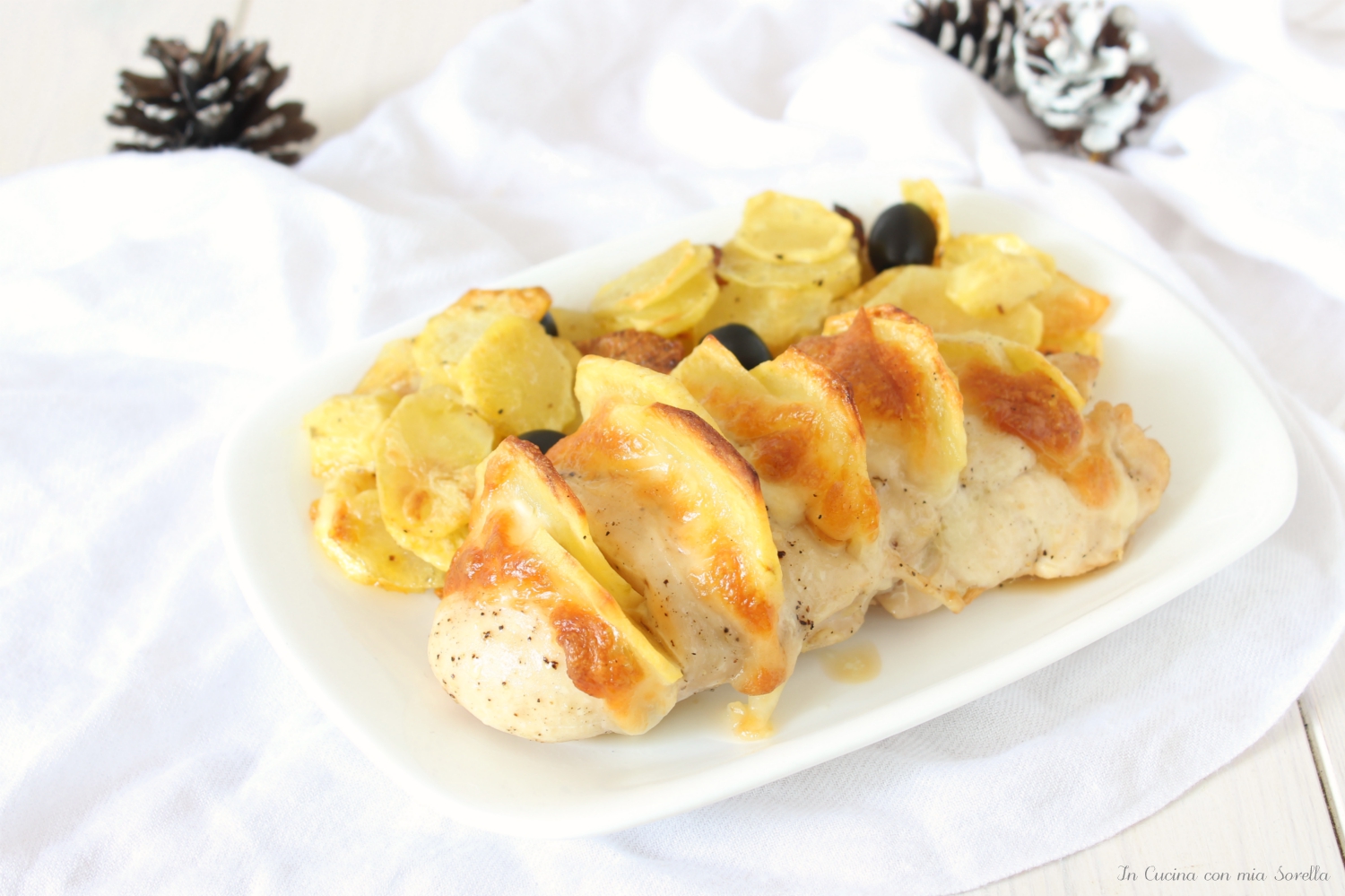 Pollo a fisarmonica con patate e scamorza