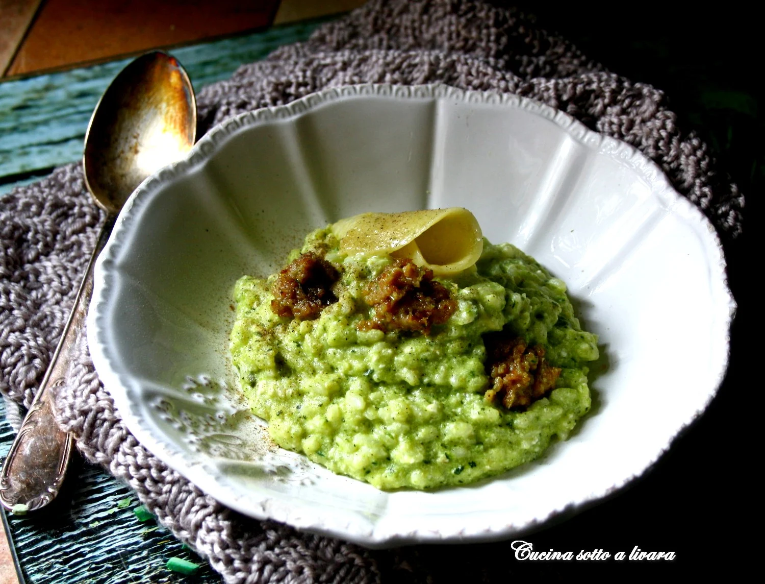 Risotto con trito di zucchine , ricotta e mix di speck e grana