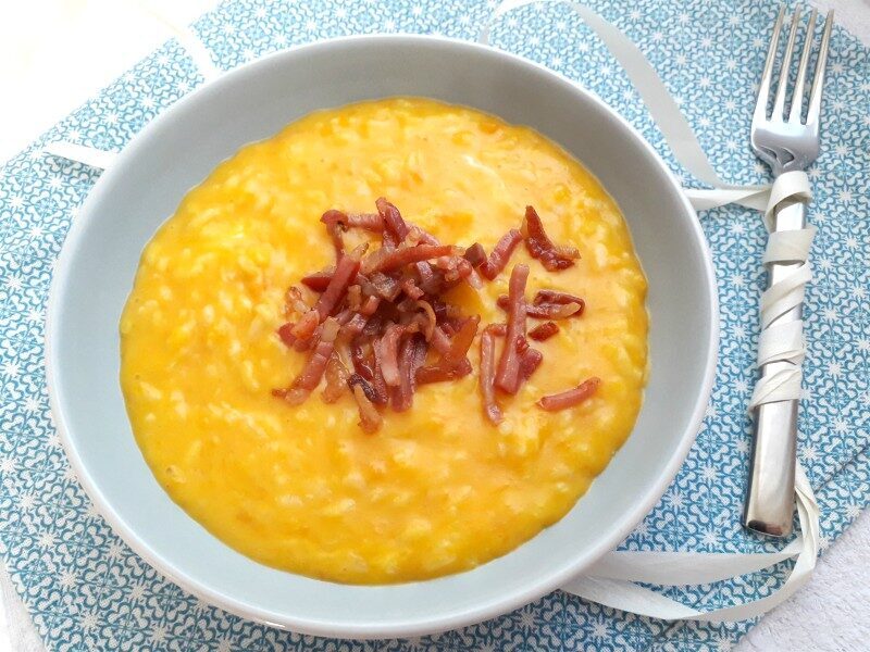 Risotto cremoso di zucca, stracchino e speck