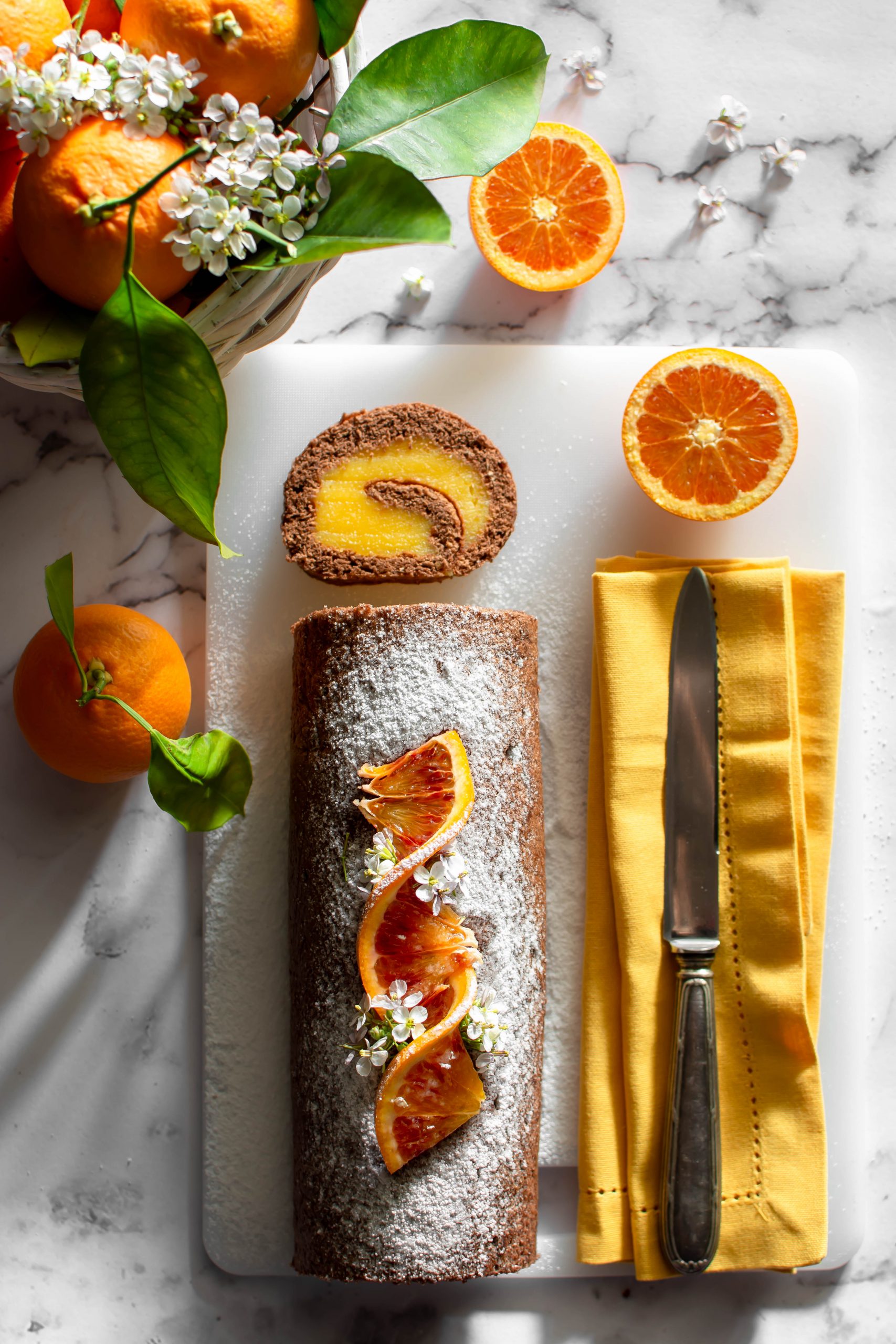Rotolo al cacao con crema all’arancia senza glutine