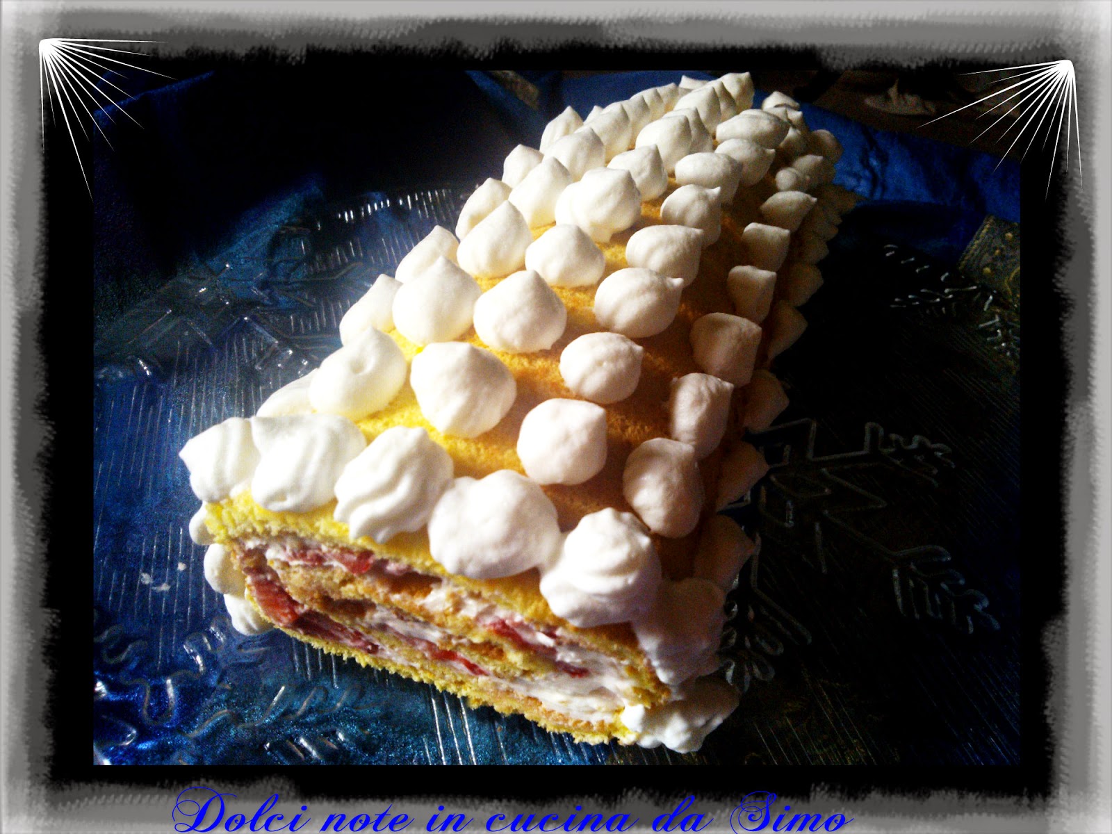Rotolo con fragole e mascarpone al profumo di arancia