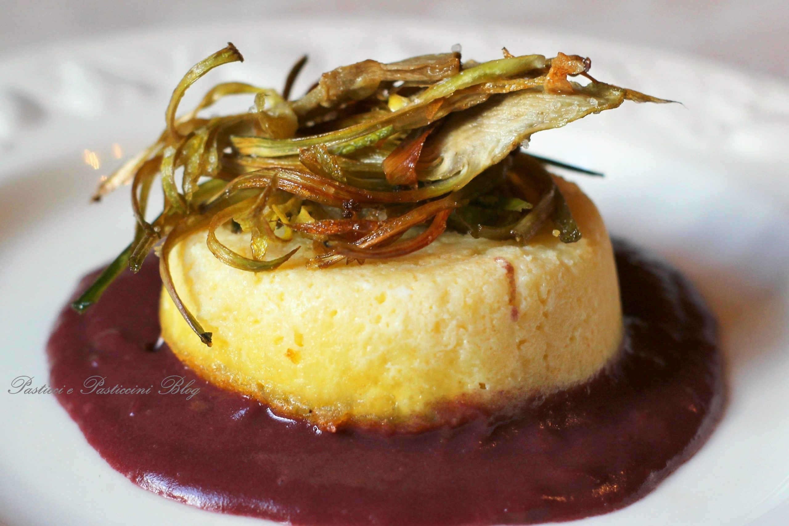 Sformatini di fontina su salsa rossa e carciofi croccanti
