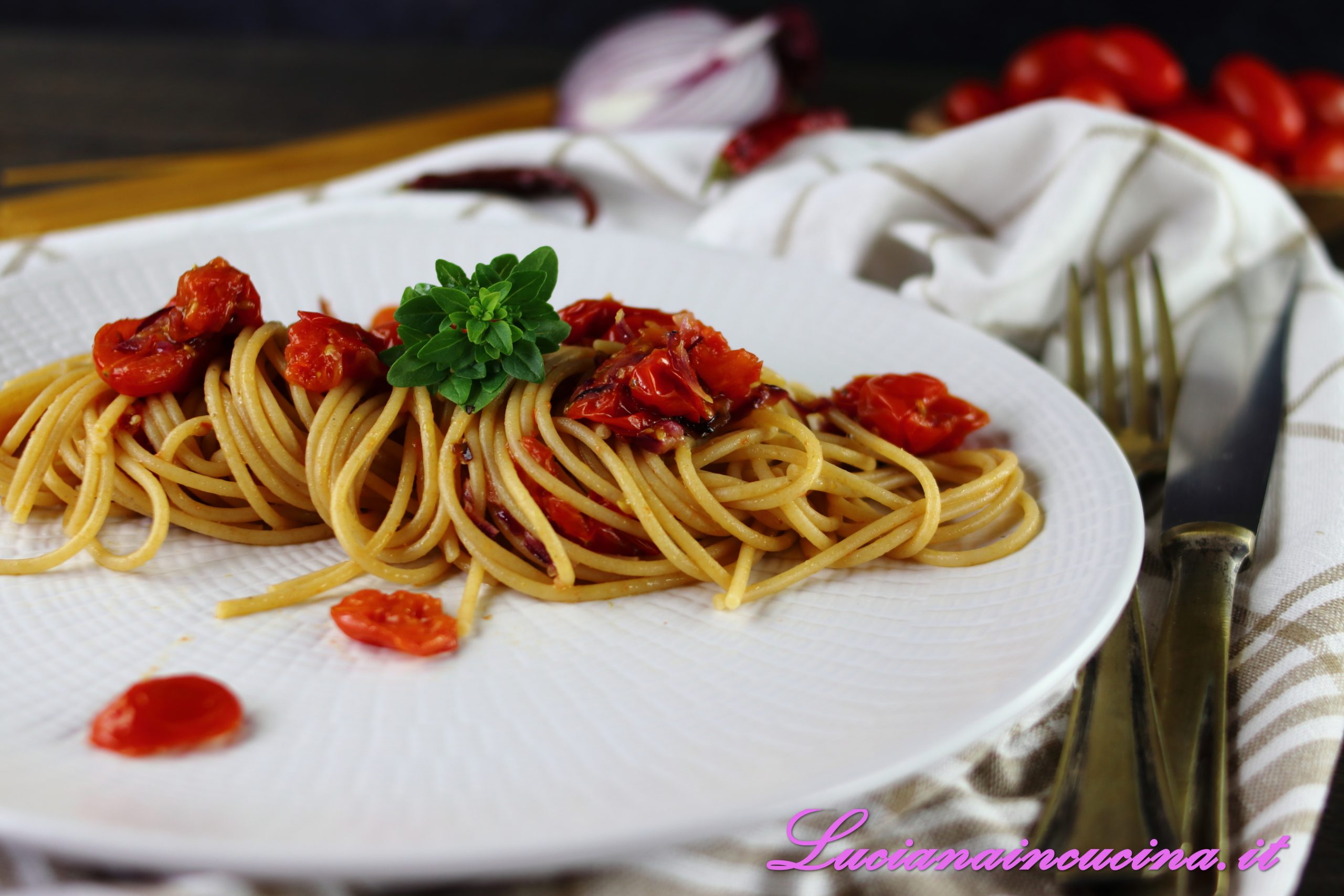 Spaghetti integrali con pomodorini al forno