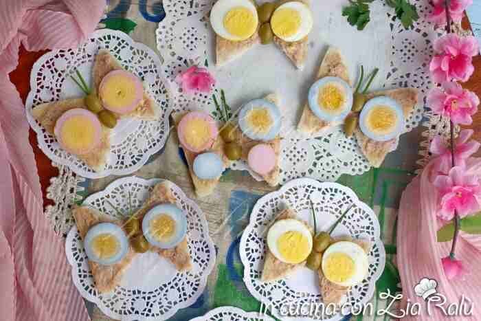 Tartine farfalla di pasqua con uova sode colorate