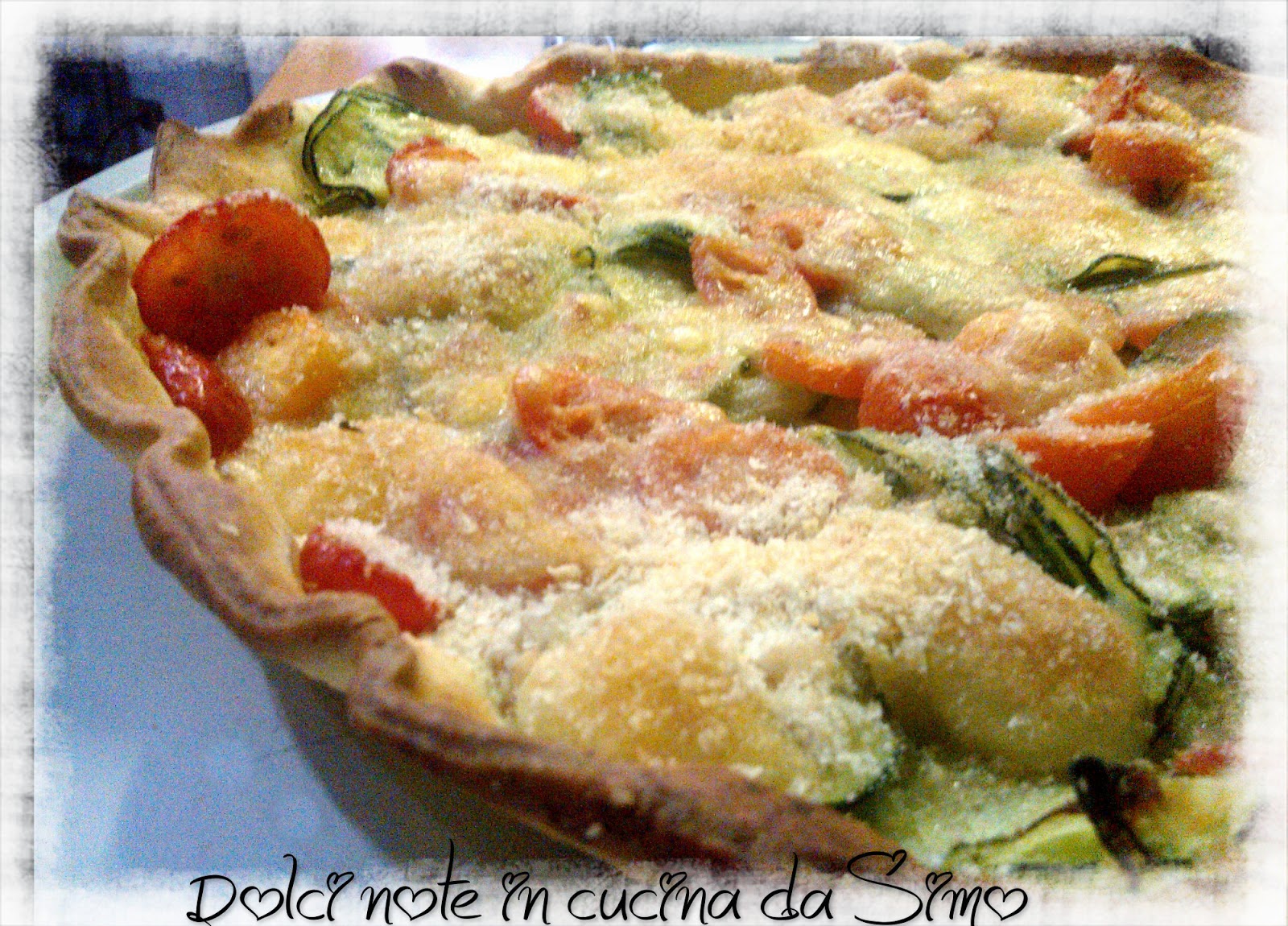 Torta rustica con zucchine e pomodorini al gratin