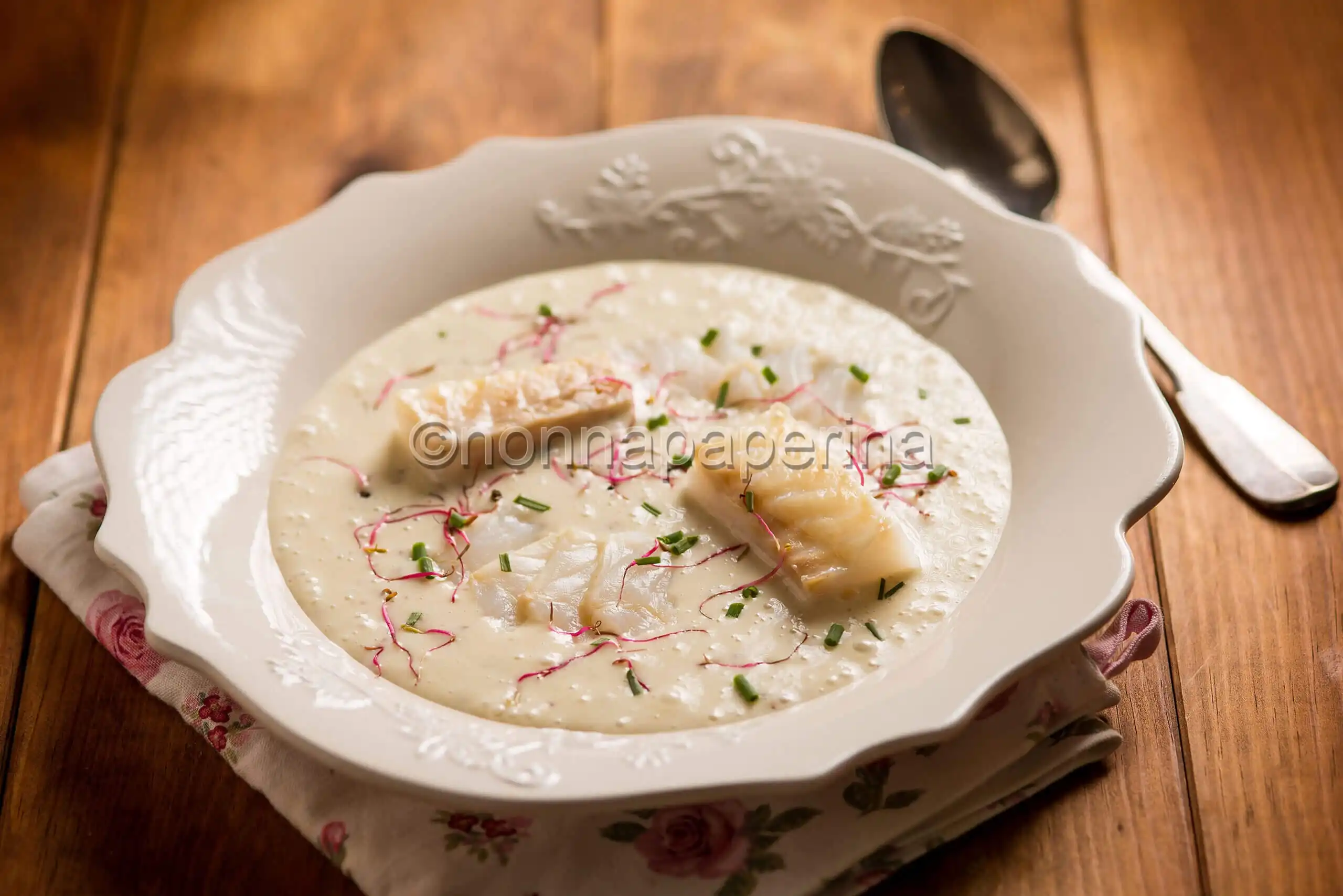 Baccalà cotto e crudo su crema di patate dolci e olive taggiasche