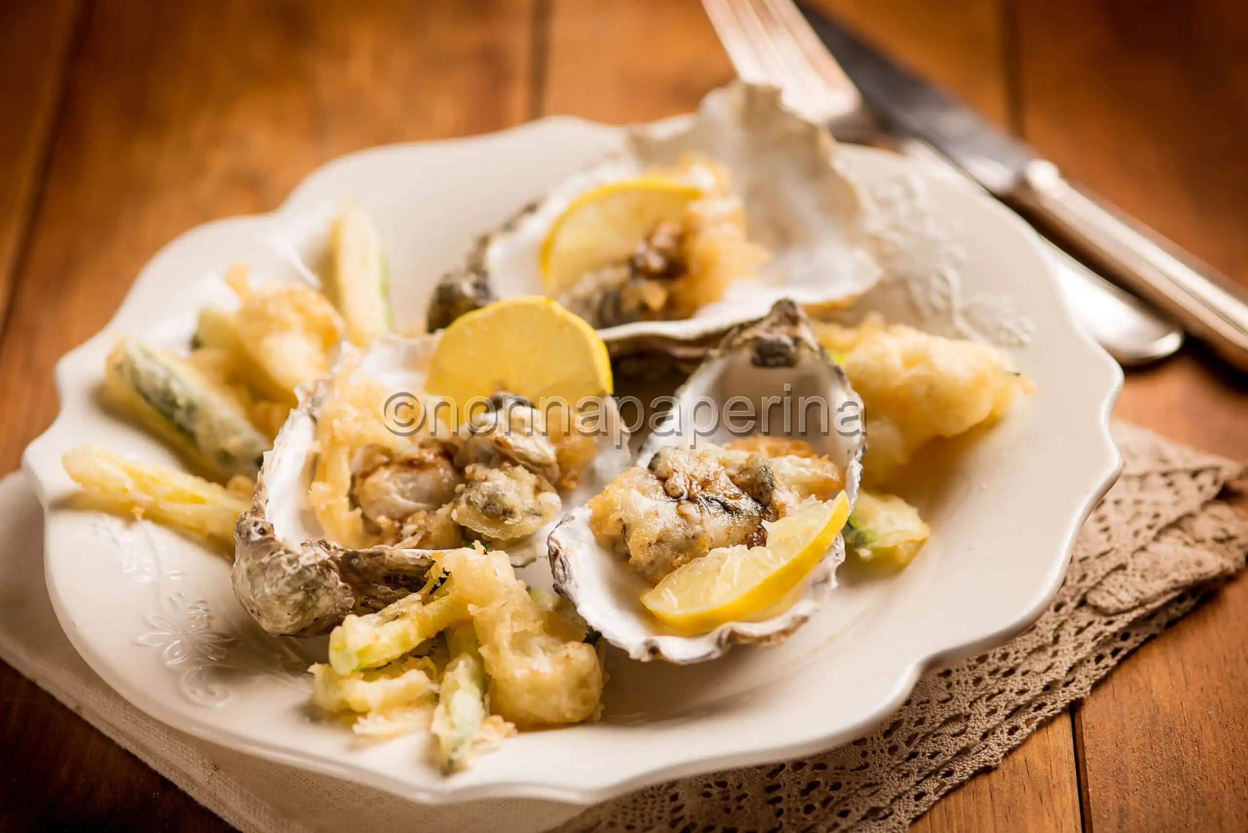 Ostriche in tempura, cucina gourmet in salsa fusion
