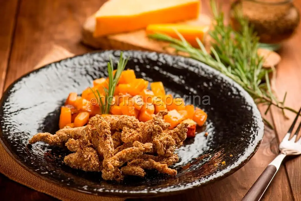 Straccetti di tacchino al sesamo e zucca, piatto aromatico