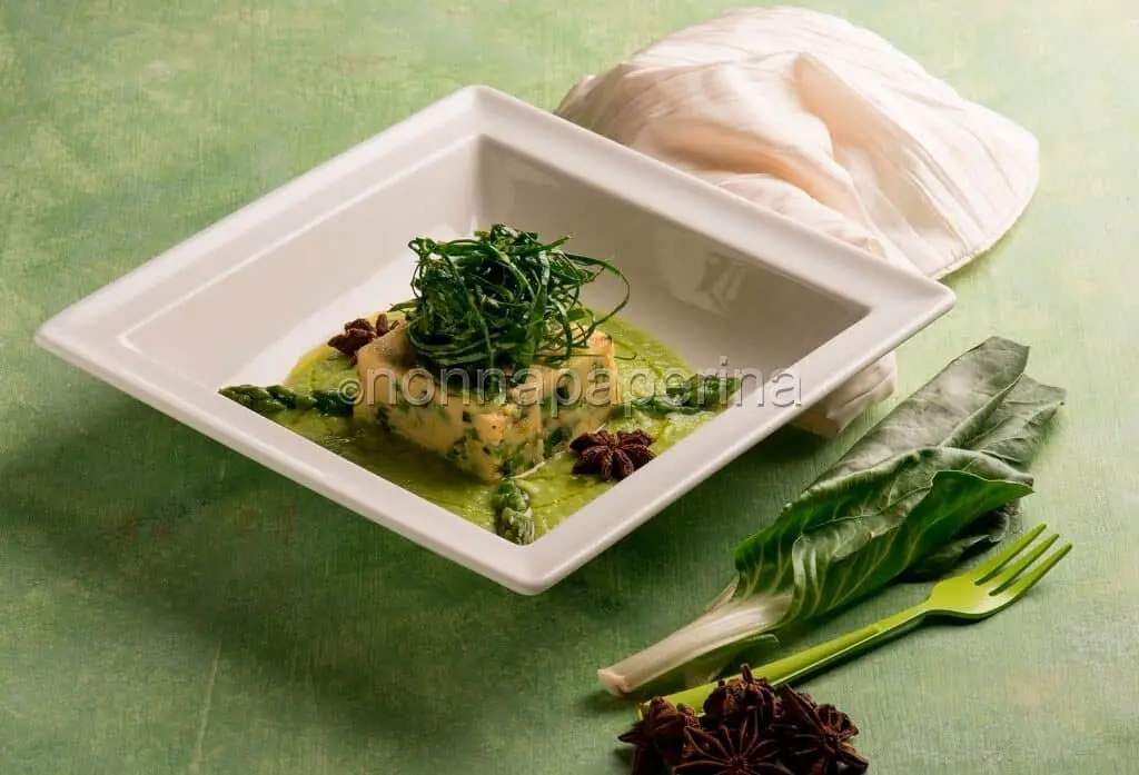 Un ottimo piatto di cous cous con ceci, lenticchie rosse e verdure miste