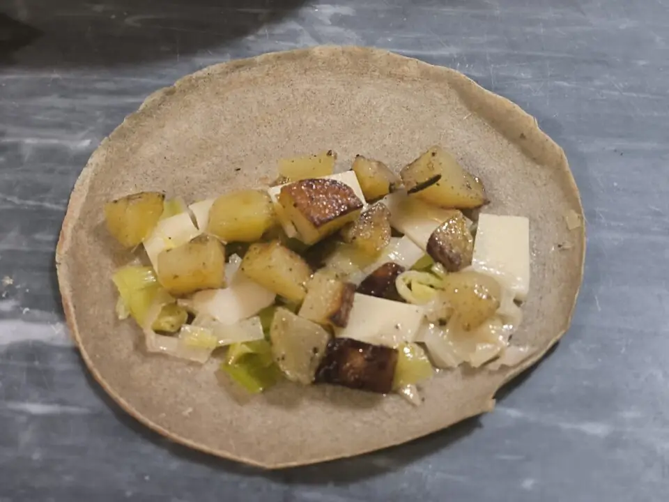 Crespelle con porro fontina e patate