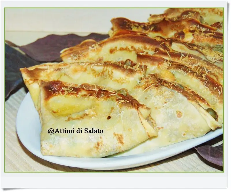 Crespelle ai carciofi piselli e prosciutto