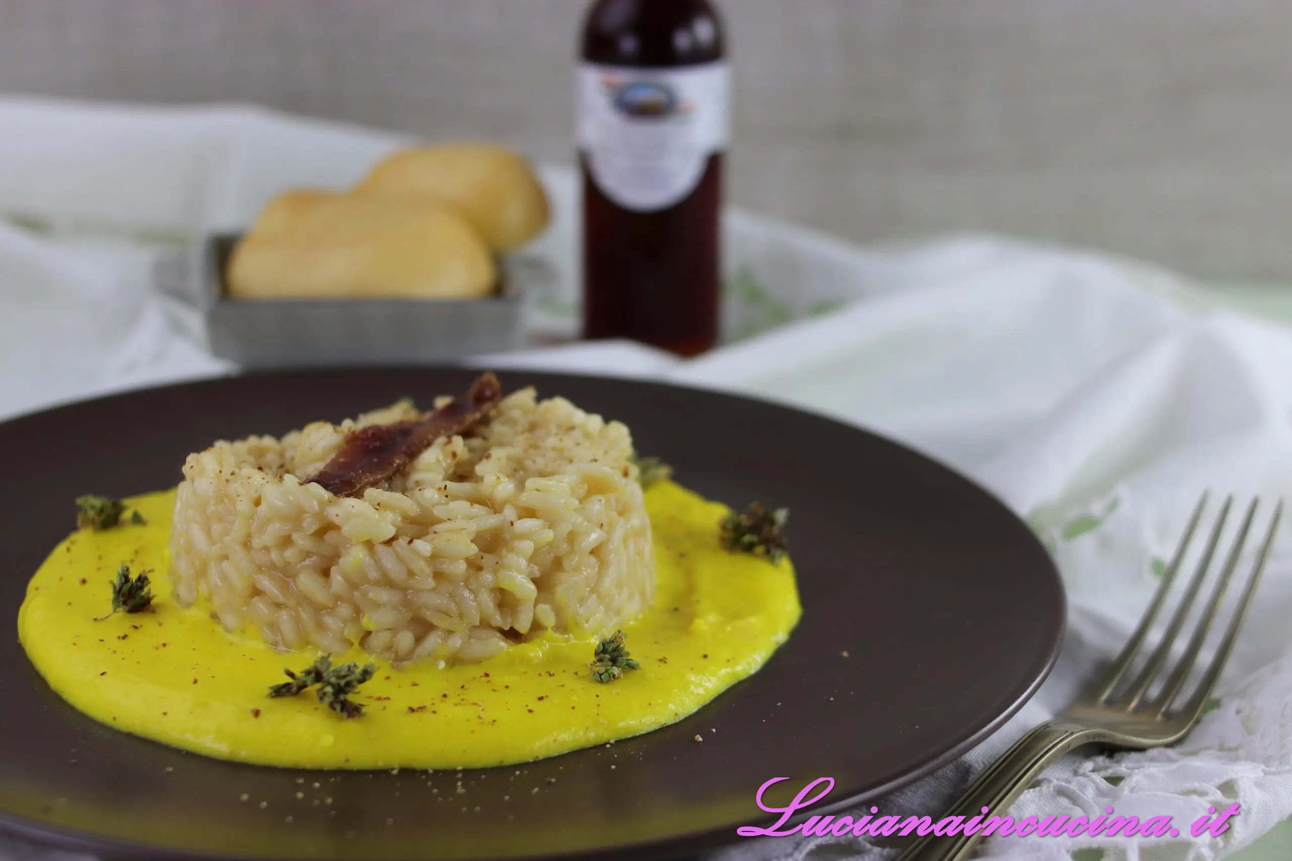 Risotto con colatura di alici e provola affumicata