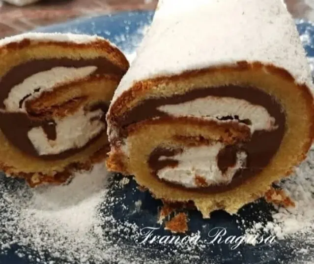 tronchetto di pandoro farcito con panna montata e crema di nocciole recipe Tronchetto di pandoro farcito con panna montata e crema di nocciole